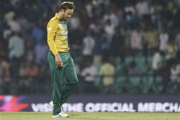 South Africa's AB de Villiers walks from the field after losing to West Indies during their ICC World Twenty20 2016 cricket match in Nagpur, India, Friday, March 25, 2016.  (AP Photo/Saurabh Das)