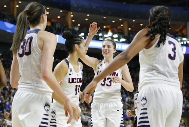 Mar 26, 2016; Bridgeport, CT, USA; Connecticut Huskies guard/forward Katie Lou Samuelson (33) reacts after a play against the Mississippi State Bulldogs during the second half in the semifinals of the Bridgeport regional of the women's NCAA Tournament at Webster Bank Arena. UConn defeated Mississippi State 98-38. Mandatory Credit: David Butler II-USA TODAY Sports