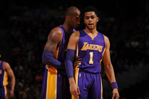DENVER, CO - MARCH 2: Kobe Bryant #24 and D'Angelo Russell #1 of the Los Angeles Lakers discuss their next play during the game against the Denver Nuggets on March 2, 2016 at the Pepsi Center in Denver, Colorado. NOTE TO USER: User expressly acknowledges and agrees that, by downloading and/or using this Photograph, user is consenting to the terms and conditions of the Getty Images License Agreement. Mandatory Copyright Notice: Copyright 2016 NBAE (Photo by Bart Young/NBAE via Getty Images)