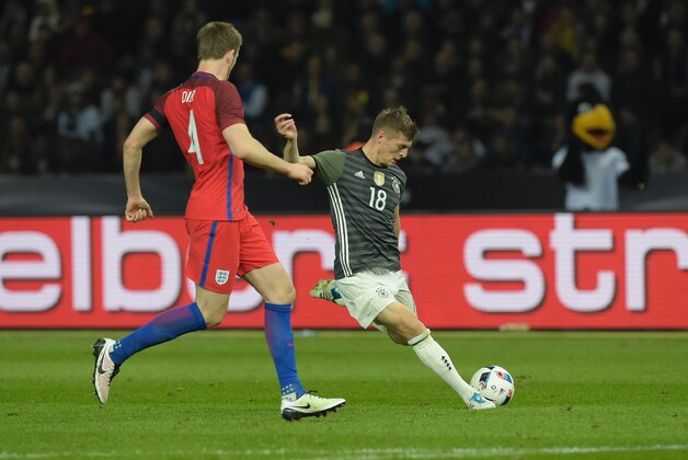 Germany's midfielder Toni Kroos (R) and England's midfielder Eric Dier vie for the ball during the friendly football match Germany v England at the Olympic Stadium in Berlin on March 26, 2016. / AFP / TOBIAS SCHWARZ (Photo credit should read TOBIAS SCHWARZ/AFP/Getty Images) Germany's midfielder Toni Kroos (R) and England's midfielder Eric Dier vie for the ball during the friendly football match Germany v England at the Olympic Stadium in Berlin on March 26, 2016. / AFP / TOBIAS SCHWARZ (Photo credit should read TOBIAS SCHWARZ/AFP/Getty Images)
