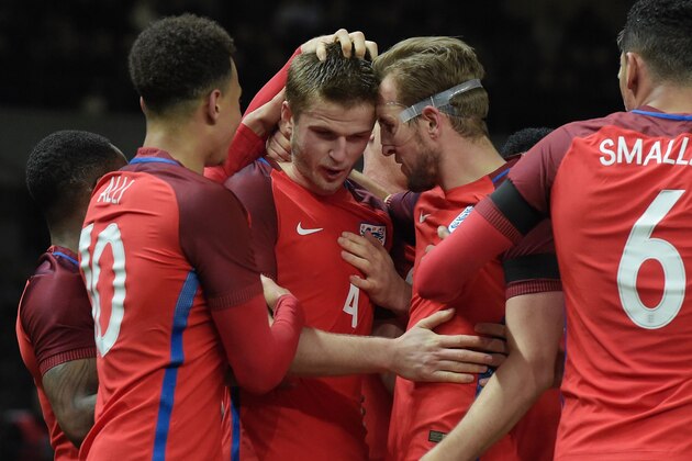 England's midfielder Eric Dier (2L) celebrates after scoring the 2-3 with England's midfielder Dele Alli (L) and England's striker Harry Kane during the friendly football match Germany v England at the Olympic Stadium in Berlin on March 26, 2016. / AFP / TOBIAS SCHWARZ        (Photo credit should read TOBIAS SCHWARZ/AFP/Getty Images)