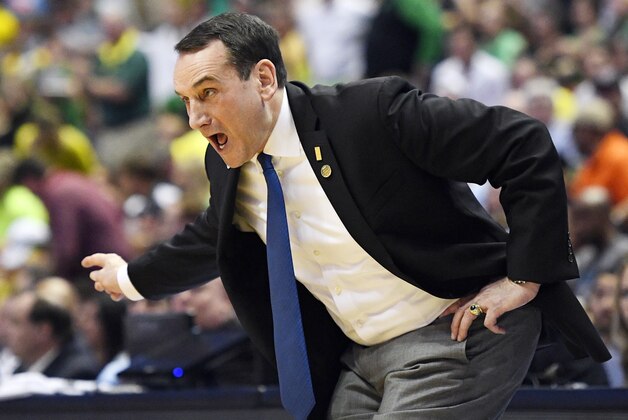 Duke head coach Mike Krzyzewski yells to his team during the first half of an NCAA college basketball game against Oregon in the regional semifinals of the NCAA Tournament, Thursday, March 24, 2016, in Anaheim, Calif. (AP Photo/Mark J. Terrill)
