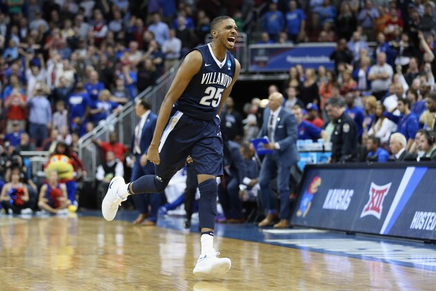 LOUISVILLE, KY - MARCH 26:  Mikal Bridges #25 of the Villanova Wildcats celebrates defeating the Kansas Jayhawks 64-59 during the 2016 NCAA Men's Basketball Tournament South Regional at KFC YUM! Center on March 26, 2016 in Louisville, Kentucky.  (Photo by Andy Lyons/Getty Images)