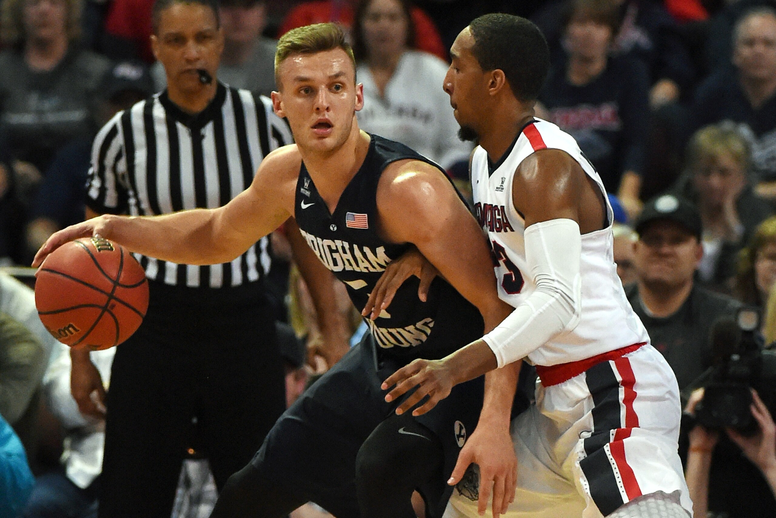 LAS VEGAS, NV - MARCH 07:  Kyle Collinsworth #5 of the Brigham Young Cougars is guarded by Eric McClellan #23 of the Gonzaga Bulldogs during a semifinal game of the West Coast Conference Basketball tournament at the Orleans Arena on March 7, 2016 in Las Vegas, Nevada. Gonzaga won 88-84.  (Photo by Ethan Miller/Getty Images)