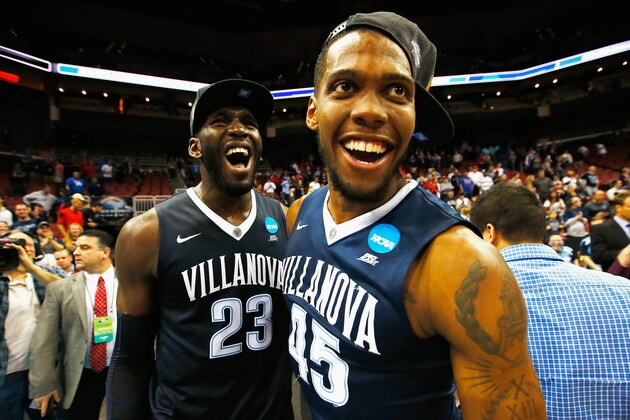 LOUISVILLE, KY - MARCH 26:  Daniel Ochefu #23 of the Villanova Wildcats and Darryl Reynolds #45 celebrate defeating the Kansas Jayhawks 64-59 during the 2016 NCAA Men's Basketball Tournament South Regional at KFC YUM! Center on March 26, 2016 in Louisville, Kentucky.  (Photo by Kevin C. Cox/Getty Images)