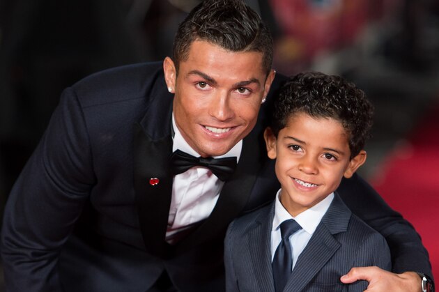 LONDON, ENGLAND - NOVEMBER 09:  Cristiano Ronaldo and son Cristiano Ronaldo Jr attend the World Premiere of 'Ronaldo' at Vue West End on November 9, 2015 in London, England.  (Photo by Ian Gavan/Getty Images)