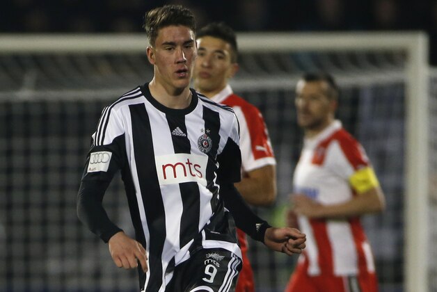 BELGRADE, SERBIA - FEBRUARY 27 : Dusan Vlahovic (C) of FK Partizan in action during the Serbian Super League match between FK Partizan and FK Crvena Zvezda at Stadium FK Partizan on February 27, 2016 in Belgrade, Serbia.  (Photo by Srdjan Stevanovic/Getty Images)
