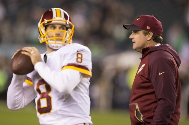 PHILADELPHIA, PA - DECEMBER 26: Kirk Cousins #8 of the Washington Redskins warms up as head coach Jay Gruden walks past him prior to the game against the Philadelphia Eagles on December 26, 2015 at Lincoln Financial Field in Philadelphia, Pennsylvania.  (Photo by Mitchell Leff/Getty Images)