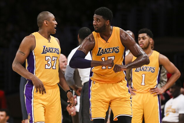 Los Angeles Lakers forward Metta World Peace (37) and center Roy Hibbert (17) in actions during the second half of an NBA basketball game against Orlando Magic Tuesday, March 8, 2016, in Los Angeles.  Lakers won 107-98. (AP Photo/Ringo H.W. Chiu)