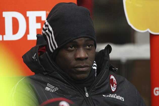 MILAN, ITALY - FEBRUARY 14:  Mario Balotelli of AC Milan looks on before the Serie A match between AC Milan and Genoa CFC at Stadio Giuseppe Meazza on February 14, 2016 in Milan, Italy.  (Photo by Marco Luzzani/Getty Images)