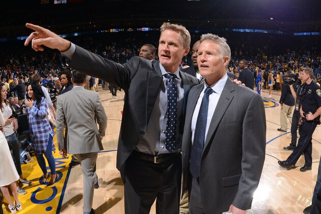 OAKLAND, CA - MARCH 27: Head Coach Steve Kerr of the Golden State Warriors exchanges greetings with Head Coach Brett Brown of the Philadelphia 76ers on March 27, 2016 at Oracle Arena in Oakland, California. NOTE TO USER: User expressly acknowledges and agrees that, by downloading and or using this photograph, user is consenting to the terms and conditions of Getty Images License Agreement. Mandatory Copyright Notice: Copyright 2016 NBAE (Photo by Noah Graham/NBAE via Getty Images)
