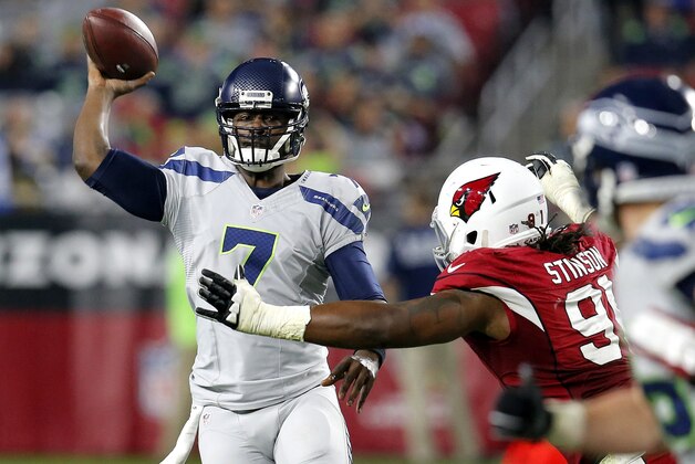 Seattle Seahawks quarterback Tarvaris Jackson (7) throws against the Arizona Cardinals during the second half of an NFL football game, Sunday, Jan. 3, 2016, in Glendale, Ariz. (AP Photo/Rick Scuteri)