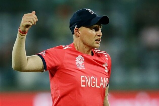 England's Joe Root reacts after taking a catch to dismiss Sri Lanka's Dasun Shanaka during their ICC Twenty20 2016 Cricket World Cup match at the Feroz Shah Kotla Cricket Stadium in New Delhi, India, Saturday, March 26, 2016. (AP Photo/Manish Swarup)