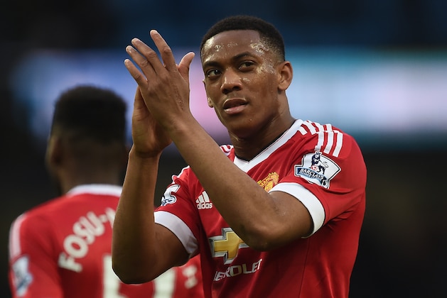 Manchester United's French striker Anthony Martial applauds the crowd following the English Premier League football match between Manchester City and Manchester United at the Etihad Stadium in Manchester, north west England, on March 20, 2016.
Manchester United won the match 1-0. / AFP / PAUL ELLIS / RESTRICTED TO EDITORIAL USE. No use with unauthorized audio, video, data, fixture lists, club/league logos or 'live' services. Online in-match use limited to 75 images, no video emulation. No use in betting, games or single club/league/player publications. / (Photo credit should read PAUL ELLIS/AFP/Getty Images) Manchester United's French striker Anthony Martial applauds the crowd following the English Premier League football match between Manchester City and Manchester United at the Etihad Stadium in Manchester, north west England, on March 20, 2016.
Manchester United won the match 1-0. / AFP / PAUL ELLIS / RESTRICTED TO EDITORIAL USE. No use with unauthorized audio, video, data, fixture lists, club/league logos or 'live' services. Online in-match use limited to 75 images, no video emulation. No use in betting, games or single club/league/player publications. / (Photo credit should read PAUL ELLIS/AFP/Getty Images)