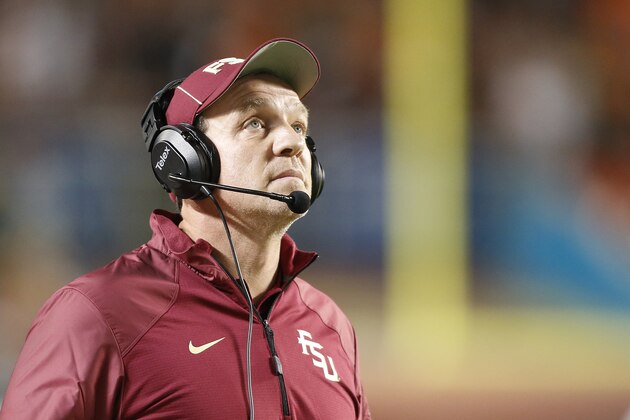 MIAMI GARDENS, FL - NOVEMBER 15: Head coach Jimbo Fisher of the Florida State Seminoles watches a replay during a break in second quarter action against the Miami Hurricanes on November 15, 2014 at Sun Life Stadium in Miami Gardens, Florida. (Photo by Joel Auerbach/Getty Images)