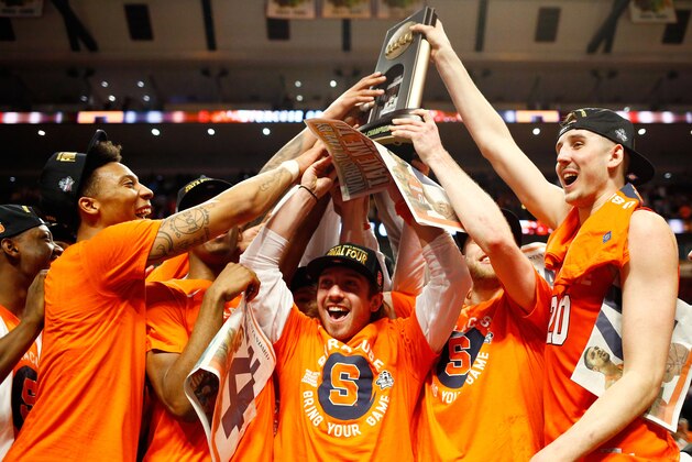 CHICAGO, IL - MARCH 27:  The Syracuse Orange celebrate their 68 to 62 win over the Virginia Cavaliers with teammates during the 2016 NCAA Men's Basketball Tournament Midwest Regional Final at United Center on March 27, 2016 in Chicago, Illinois.  (Photo by Jamie Squire/Getty Images)