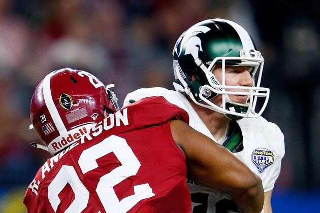 ARLINGTON, TX - DECEMBER 31:  Ryan Anderson #22 of the Alabama Crimson Tide sacks Connor Cook #18 of the Michigan State Spartans in the second quarter during the Goodyear Cotton Bowl at AT&T Stadium on December 31, 2015 in Arlington, Texas.  (Photo by Jamie Squire/Getty Images)