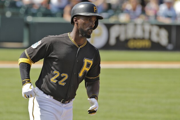 Pittsburgh Pirates' Andrew McCutchen runs around the bases after his home run off Tampa Bay Rays starting pitcher Jake Odorizzi during the fourth inning of a spring training baseball game Friday, March 11, 2016, in Bradenton, Fla. (AP Photo/Chris O'Meara)