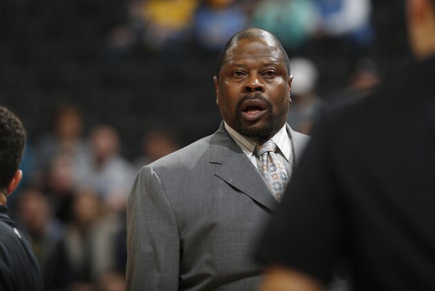 Charlotte Hornets associate head coach Patrick Ewing looks on during the first half of an NBA basketball game  Sunday, Jan. 10, 2016, in Denver. (AP Photo/David Zalubowski)