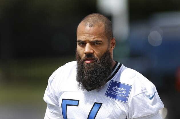 Detroit Lions line backer DeAndre Levy walks to practice during NFL football training camp in Allen Park, Mich., Tuesday, Aug. 4, 2015.  (AP Photo/Paul Sancya)