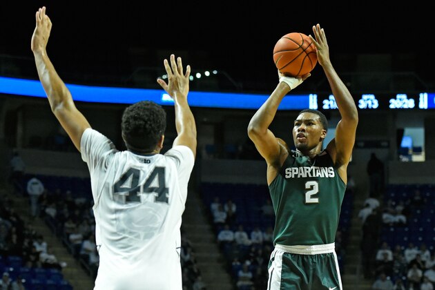 UNIVERSITY PARK, PA - JANUARY 10:  Javon Bess #2 of the Michigan State Spartans shoots the ball as Julian Moore #44 of the Penn State Nittany Lions defends during the second half at the Bryce Jordan Center on January 10, 2016 in University Park, Pennsylvania.  Michigan State won 92-65.  (Photo by Rich Barnes/Getty Images)