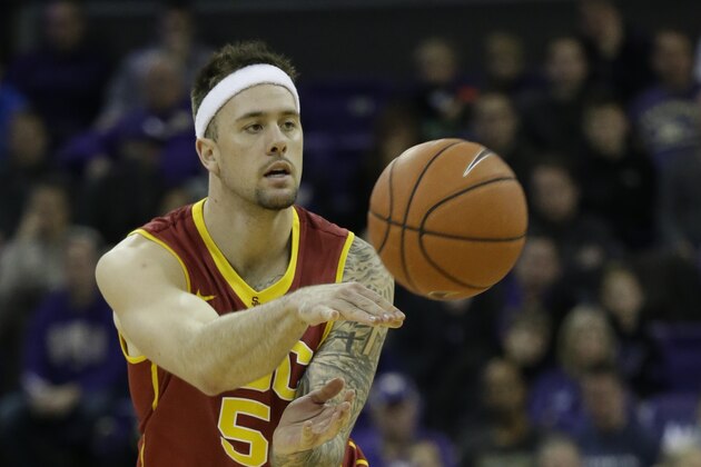 Southern California's Katin Reinhardt in action against Washingtonw in an NCAA college basketball game Sunday, Jan. 3, 2016, in Seattle. (AP Photo/Elaine Thompson)