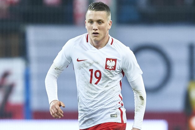 POZNAN, POLAND - MARCH 23: Piotr Zielinski of Poland  controls the ball during the international friendly soccer match between Poland and Serbia at the Inea Stadium on March 23, 2016 in Poznan, Poland. (Photo by Adam Nurkiewicz/Getty Images)