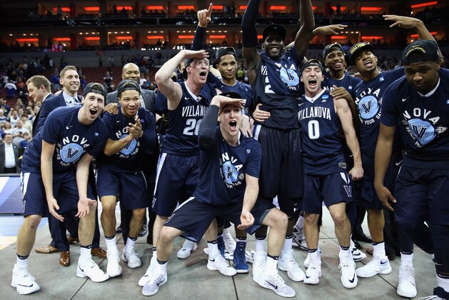 LOUISVILLE, KY - MARCH 26:  The Villanova Wildcats celebrate defeating the Kansas Jayhawks 64-59 during the 2016 NCAA Men's Basketball Tournament South Regional at KFC YUM! Center on March 26, 2016 in Louisville, Kentucky.  (Photo by Andy Lyons/Getty Images)