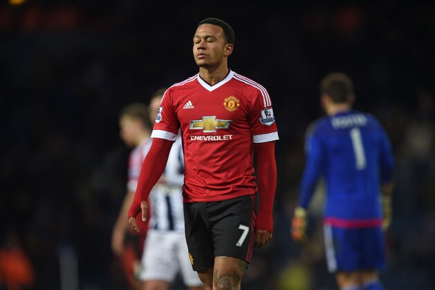 Manchester United's Dutch midfielder Memphis Depay reacts to defeat after the English Premier League football match between West Bromwich Albion and Manchester United at The Hawthorns stadium in West Bromwich, central England, on March 6, 2016.

West Brom won the game 1-0. / AFP / Paul ELLIS / RESTRICTED TO EDITORIAL USE. No use with unauthorized audio, video, data, fixture lists, club/league logos or 'live' services. Online in-match use limited to 75 images, no video emulation. No use in betting, games or single club/league/player publications.  /         (Photo credit should read PAUL ELLIS/AFP/Getty Images)