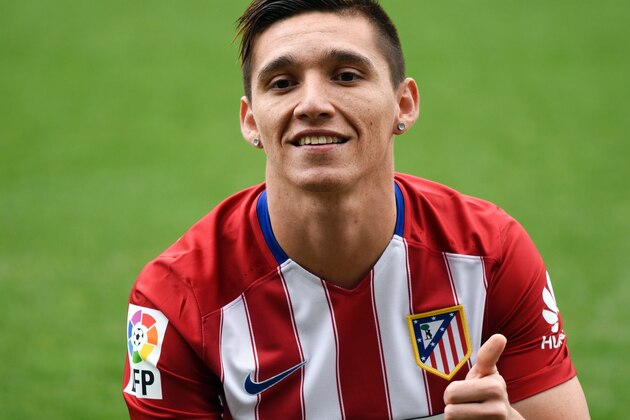 New Atletico de Madrid's Argentinian midfielder Matias Kranevitter poses on the pitch during his presentation at the Vicente Calderon stadium in Madrid, on January 4, 2016. AFP PHOTO/ PEDRO ARMESTRE / AFP / PEDRO ARMESTRE        (Photo credit should read PEDRO ARMESTRE/AFP/Getty Images)