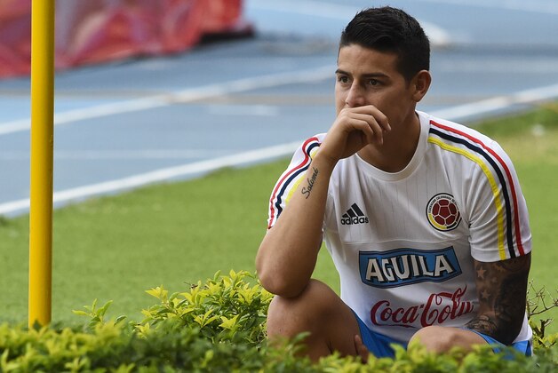 Colombia's national football team player, James Rodriguez gestures during a training session at the Metropolitano Stadium in Barranquilla on March 26, 2016. Colombia will face Ecuador on March 29 in Barranquilla in a FIFA World Cup Russia 2018 South American qualifier. AFP PHOTO/Luis Acosta / AFP / LUIS ACOSTA        (Photo credit should read LUIS ACOSTA/AFP/Getty Images)