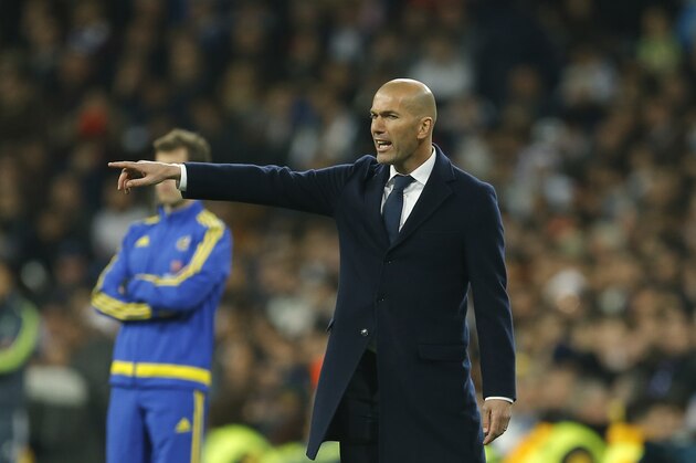 Real Madrid's head coach Zinedine Zidane gives instructions from the sideline during a Spanish La Liga soccer match between Real Madrid and Sevilla at the Santiago Bernabeu stadium, in Madrid, Sunday, March 20, 2016. Real Madrid defeated Sevilla 4-0. (AP Photo/Francisco Seco) Real Madrid's head coach Zinedine Zidane gives instructions from the sideline during a Spanish La Liga soccer match between Real Madrid and Sevilla at the Santiago Bernabeu stadium, in Madrid, Sunday, March 20, 2016. Real Madrid defeated Sevilla 4-0. (AP Photo/Francisco Seco)