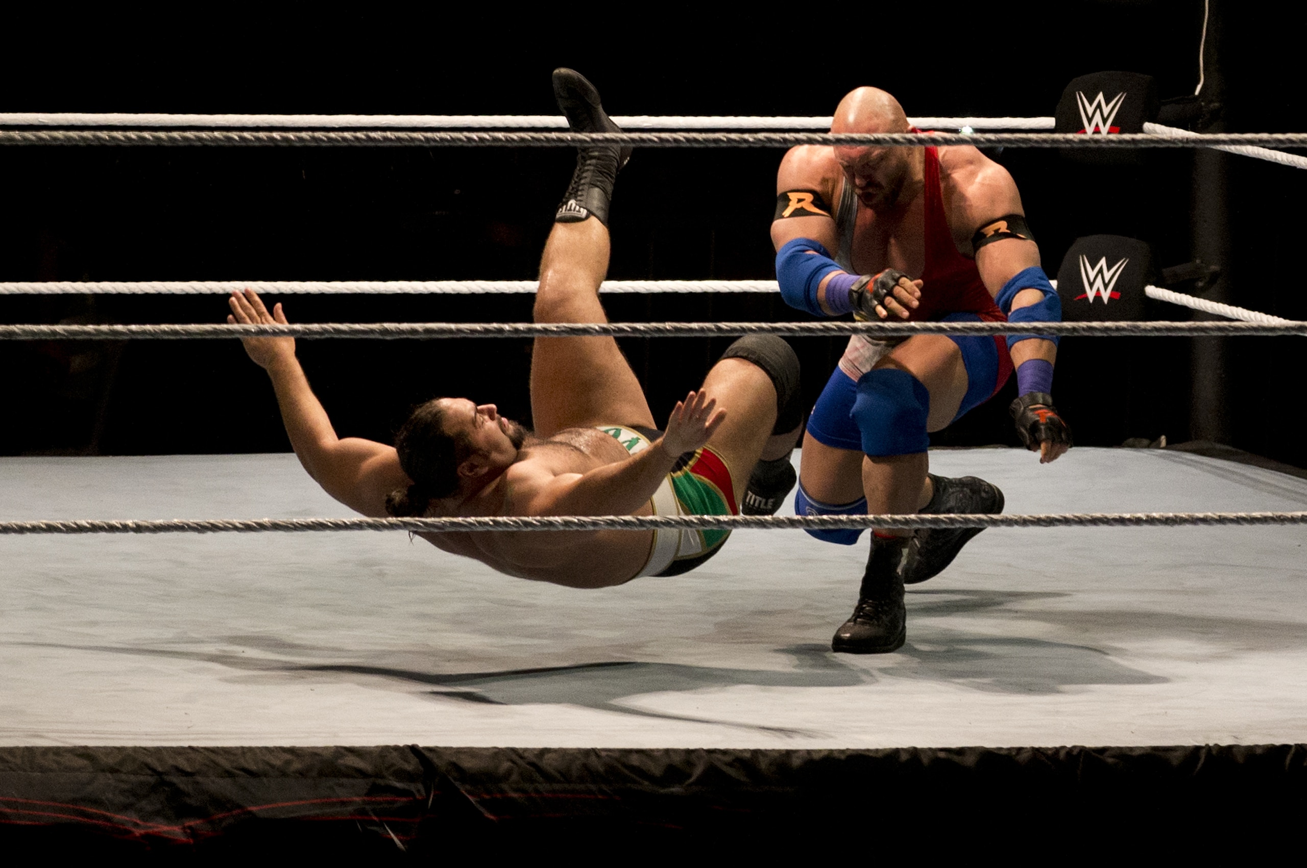 WWE wrestler Ryback, right, throws down Alexander Rusev during WWE Live India Tour, in New Delhi, Friday, Jan. 15, 2016. WWE returned to Indian after a gap of 13 years to entertain their fans. (AP Photo/Manish Swarup)