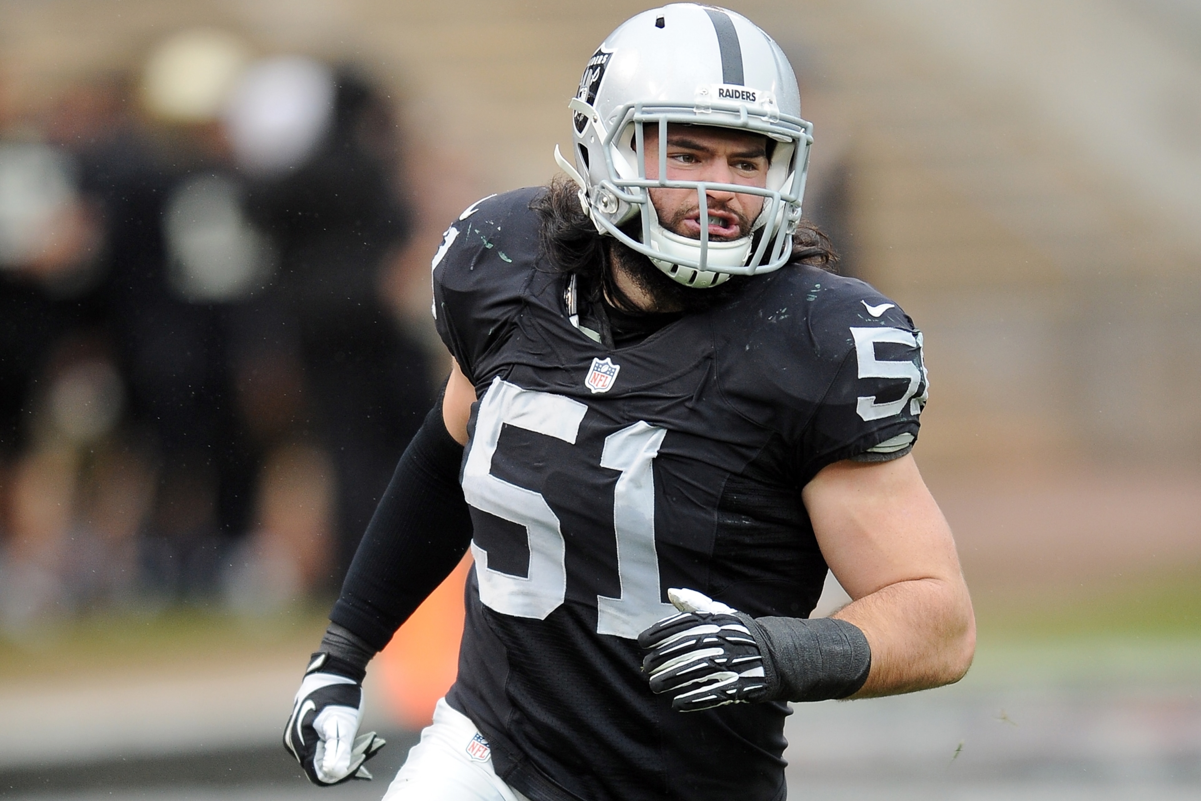 Oakland Raiders safety linebacker (51) Ben Heeney reacts after a Raiders sack of Green Bay Packers quarterback (12) Aaron Rodgers during a game played at O.co Coliseum in Oakland on Sunday, Dec. 20, 2015. (AP Photo/John Cordes)