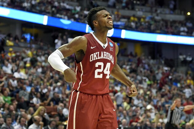 Oklahoma guard Buddy Hield celebrates after scoring during the first half of an NCAA college basketball game against Oregon in the regional finals of the NCAA Tournament, Saturday, March 26, 2016, in Anaheim, Calif. (AP Photo/Mark J. Terrill)