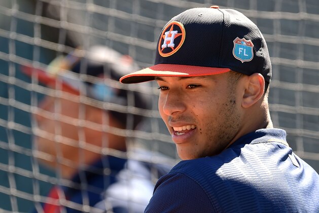 BRADENTON, FL - MARCH 06:  Carlos Correa #1 of the Houston Astros participates in warmups prior to a spring training game against the Pittsburgh Pirates at McKechnie Field on March 6, 2016 in Bradenton, Florida.  (Photo by Stacy Revere/Getty Images)