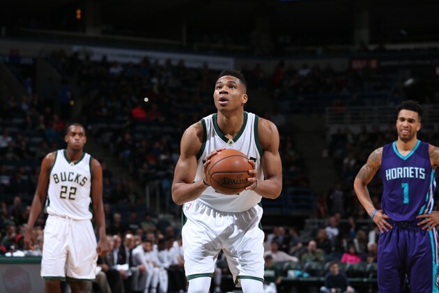 Milwaukee, WI - MARCH 26: Giannis Antetokounmpo #34 of the Milwaukee Bucks shoots a free throw against the Charlotte Hornets on March 26, 2016 at the BMO Harris Bradley Center in Milwaukee, Wisconsin. NOTE TO USER: User expressly acknowledges and agrees that, by downloading and or using this Photograph, user is consenting to the terms and conditions of the Getty Images License Agreement. Mandatory Copyright Notice: Copyright 2016 NBAE (Photo by Gary Dineen/NBAE via Getty Images)
