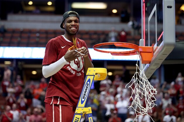ANAHEIM, CA - MARCH 26:  Buddy Hield #24 of the Oklahoma Sooners smiles after cutting a piece of the net after the Sooners 80-68 victory against the Oregon Ducks in the NCAA Men's Basketball Tournament West Regional Final at Honda Center on March 26, 2016 in Anaheim, California.  (Photo by Sean M. Haffey/Getty Images)