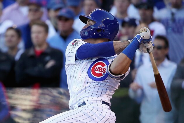 CHICAGO, IL - OCTOBER 13:  Javier Baez #9 of the Chicago Cubs hits a three-run home run in the second inning against the St. Louis Cardinals during game four of the National League Division Series at Wrigley Field on October 13, 2015 in Chicago, Illinois.  (Photo by Jonathan Daniel/Getty Images)
