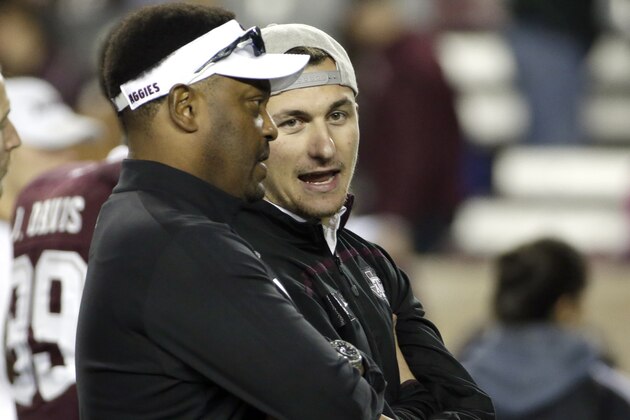 Cleveland Browns quarterback Johnny Manziel, right, talks with Texas A&M coach Kevin Sumlin  before an NCAA college football game against Auburn Saturday, Nov. 7, 2015, in College Station, Texas. (AP Photo/David J. Phillip)