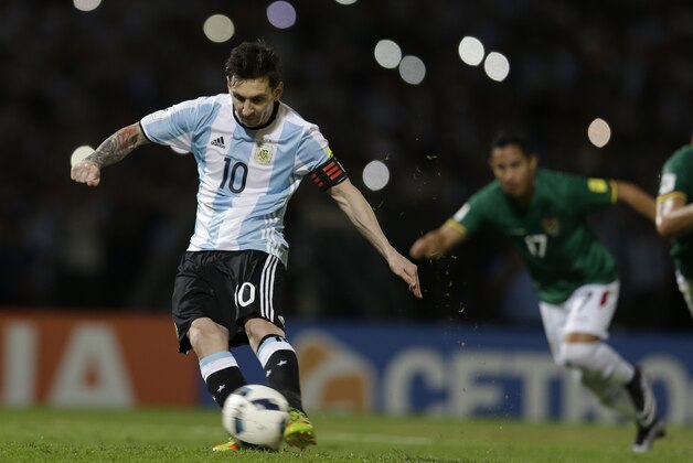Argentina's Lionel Messi strikes that ball to score a penalty against Bolivia during a 2018 World Cup qualifying soccer match in Cordoba, Argentina, Tuesday, March 29, 2016.(AP Photo/Natacha Pisarenko)