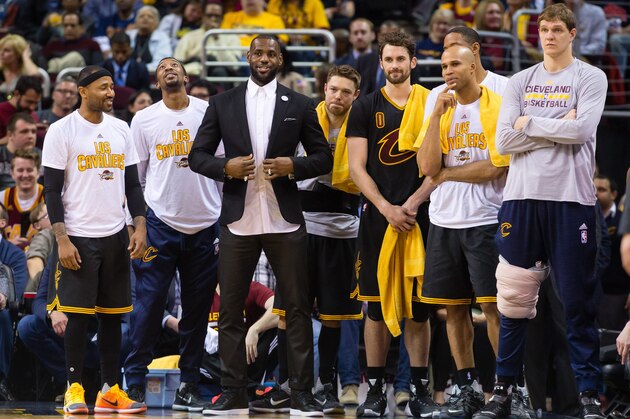 CLEVELAND, OH - MARCH 29: LeBron James #23 of the Cleveland Cavaliers watches with his teammates from the bench during the first half against the Houston Rockets at Quicken Loans Arena on March 29, 2016 in Cleveland, Ohio. NOTE TO USER: User expressly acknowledges and agrees that, by downloading and/or using this photograph, user is consenting to the terms and conditions of the Getty Images License Agreement. Mandatory copyright notice. (Photo by Jason Miller/Getty Images)