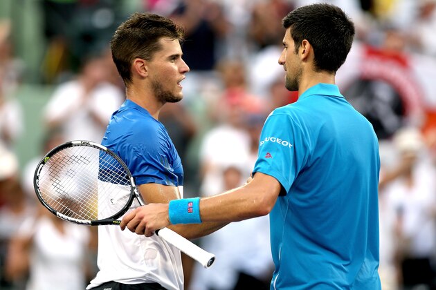 KEY BISCAYNE, FL - MARCH 29:  Dominic Thiem of Austria congratulates Novak Djokovic of Serbia after their match during the Miami Open presented by Itau at Crandon Park Tennis Center on March 29, 2016 in Key Biscayne, Florida.  (Photo by Matthew Stockman/Getty Images)
