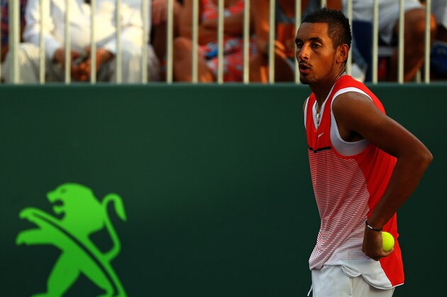 KEY BISCAYNE, FL - MARCH 28:  Nick Kyrgios of Australia plays a match against Tim Smyczek during Day 8 of the Miami Open presented by Itau at Crandon Park Tennis Center on March 28, 2016 in Key Biscayne, Florida.  (Photo by Mike Ehrmann/Getty Images)