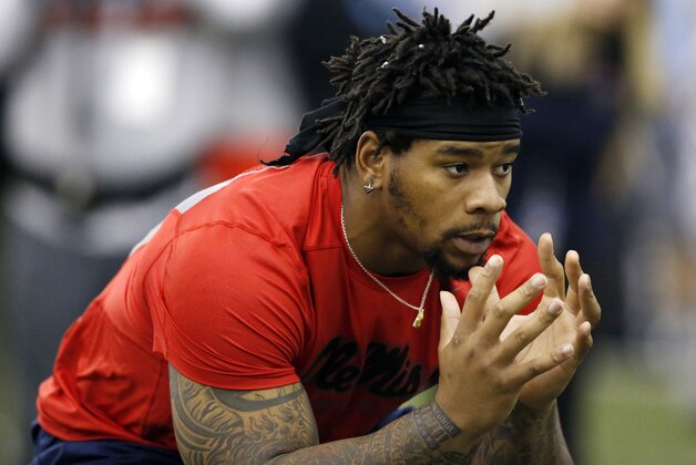Defensive tackle Robert Nkemdiche steps into a agility drill at  Mississippi's NFL football Pro Day, Monday, March 28, 2016, in Oxford, Miss. The event is to showcase players for the upcoming NFL football draft.  (AP Photo/Rogelio V. Solis)