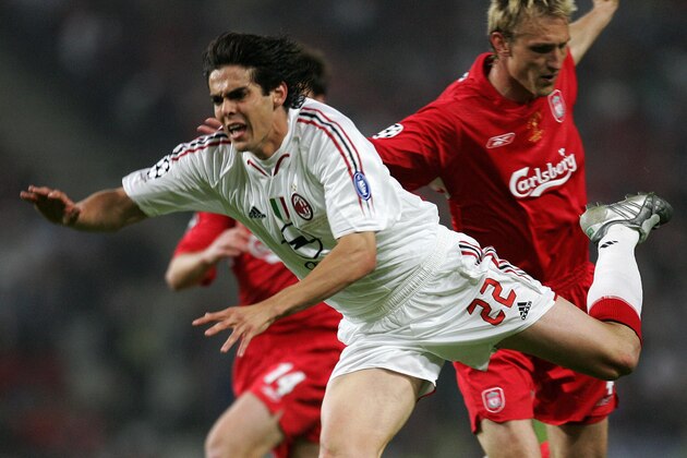 Istanbul, Turkey:  AC Milan's Brazilian forward Kaka vies with Liverpool's Finnish defender Sami Hypia (R) during the UEFA Champions league football final AC Milan vs Liverpool, 25 May 2005 at the Ataturk Stadium in Istanbul. AC Milan vs Liverpool 3-3.  AFP PHOTO FILIPPO MONTEFORTE  (Photo credit should read FILIPPO MONTEFORTE/AFP/Getty Images)