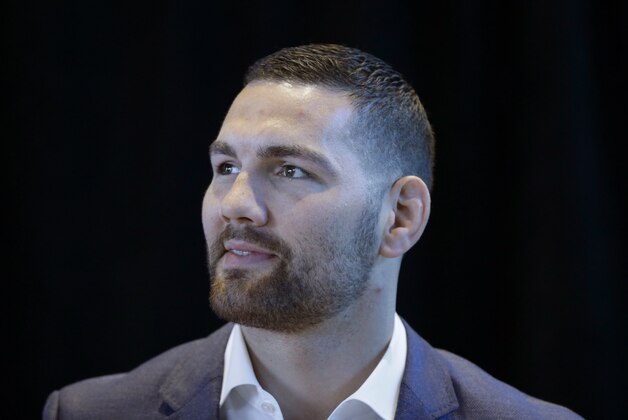 Chris Weidman, Former UFC middleweight world champion, participates in a news conference in New York, Tuesday, Feb. 23, 2016. Weidman and others were advocating for the legalization of professional mixed martial arts in New York state. (AP Photo/Seth Wenig)