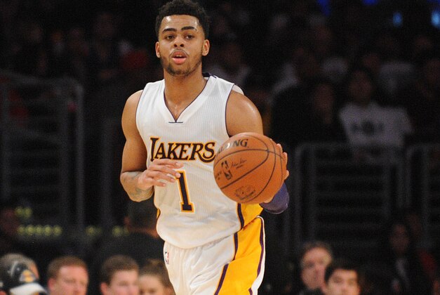 March 27, 2016; Los Angeles, CA, USA; Los Angeles Lakers guard D'Angelo Russell (1) moves the ball up court against Washington Wizards during the second half at Staples Center. Mandatory Credit: Gary A. Vasquez-USA TODAY Sports