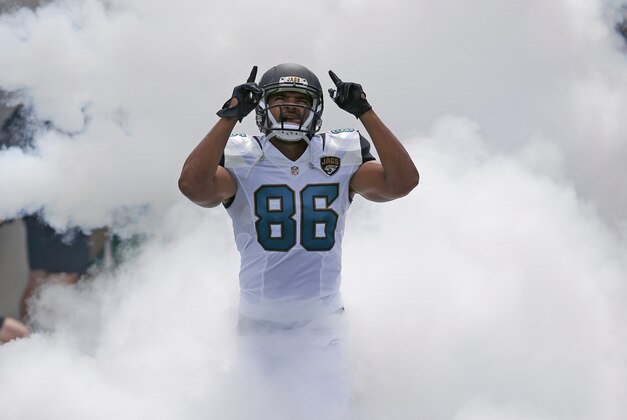 Jacksonville Jaguars tight end Clay Harbor runs on the field before an NFL football game against the Carolina Panthers in Jacksonville, Fla., Sunday, Sept. 13, 2015.(AP Photo/Stephen B. Morton)