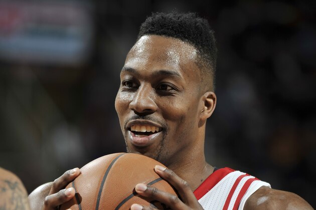 CLEVELAND, OH - MARCH 29:  Dwight Howard #12 of the Houston Rockets handles the ball against the Cleveland Cavaliers on March 29, 2016 at Quicken Loans Arena in Cleveland, Ohio. NOTE TO USER: User expressly acknowledges and agrees that, by downloading and/or using this Photograph, user is consenting to the terms and conditions of the Getty Images License Agreement. Mandatory Copyright Notice: Copyright 2016 NBAE  (Photo by David Liam Kyle/NBAE via Getty Images)